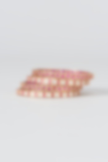 Gold Finish Kundan Polki & Ruby Stone Bangles (Set of 4) by Zevar by Geeta at Pernia's Pop Up Shop