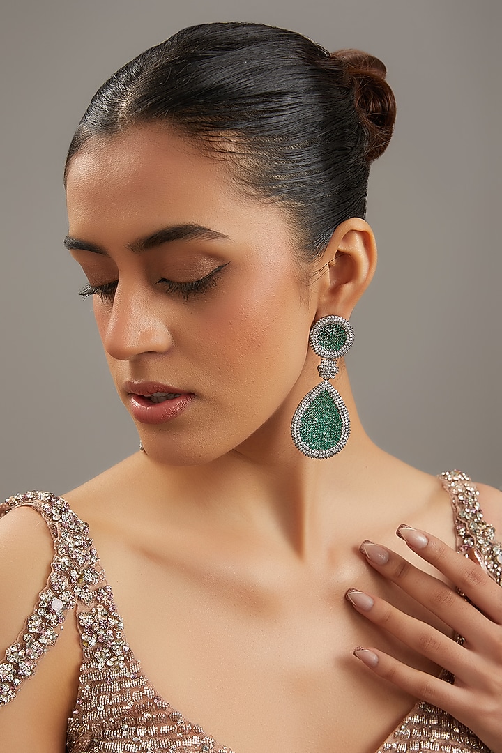 White Finish Zircon & Green Stone Dangler Earrings by Zevar by Geeta at Pernia's Pop Up Shop