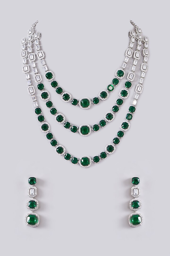White Finish Zircon & Emerald Stone Layered Necklace Set by Zevar By Geeta at Pernia's Pop Up Shop