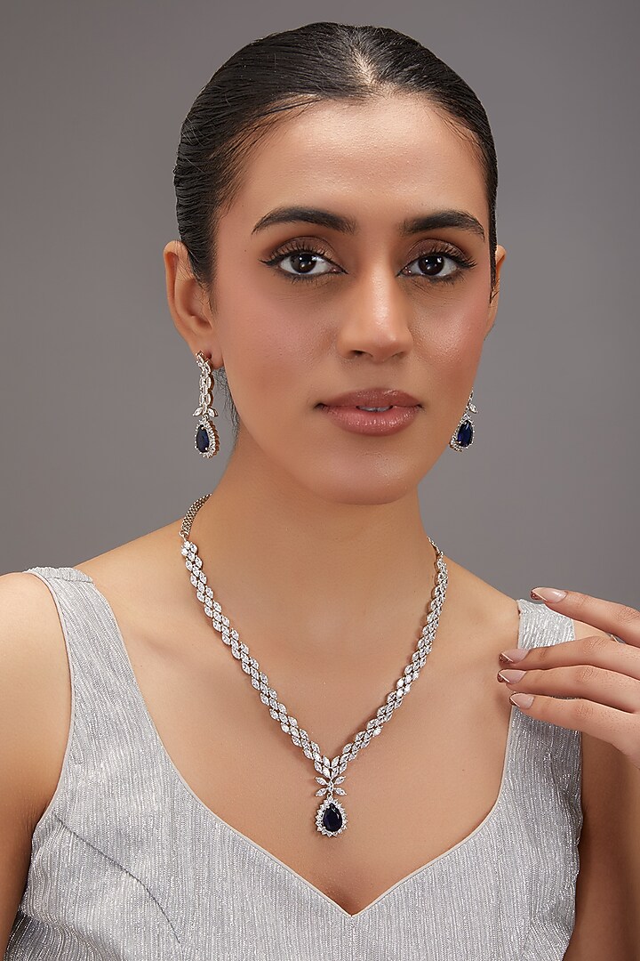 White Finish Zircon & Sapphire Stone Necklace Set by Zevar By Geeta at Pernia's Pop Up Shop