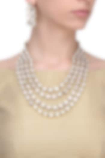 Gold finish kundan 4-line necklace set available only at Pernia's Pop Up Shop.