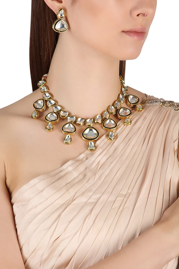 Gold finish kundan and blue meena work necklace set available only at Pernia's Pop Up Shop.