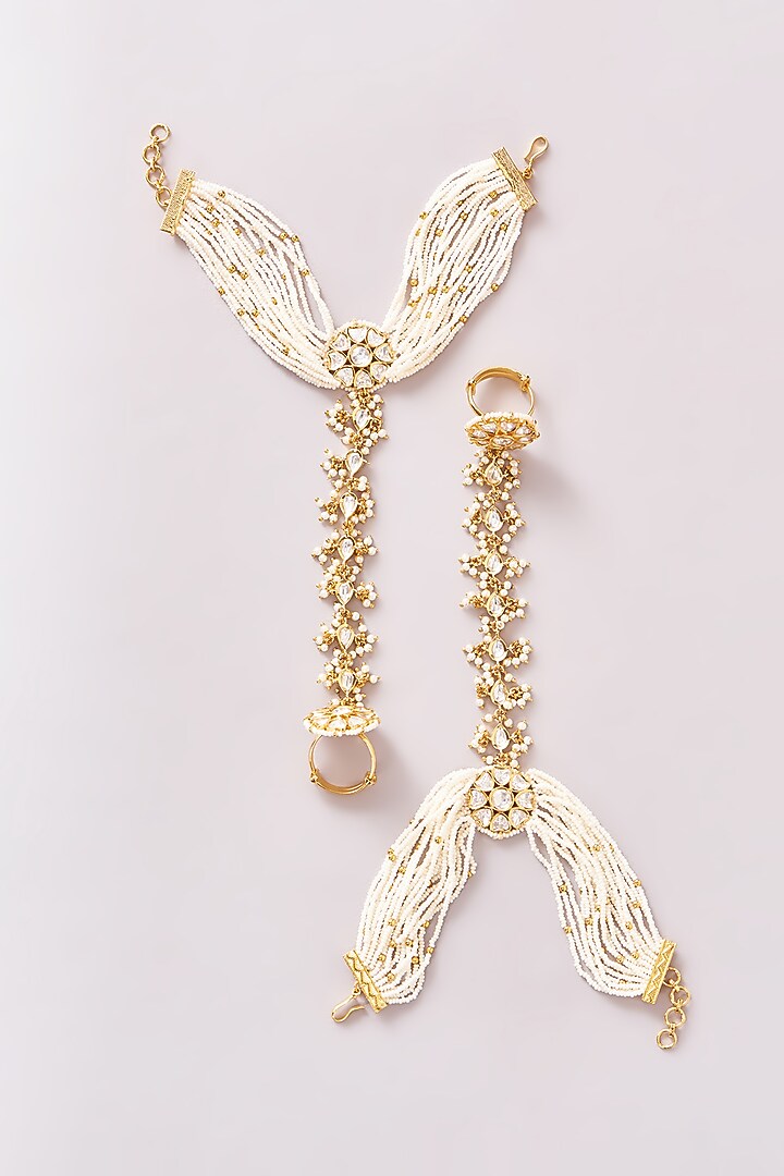 Gold Finish Kundan Polki & Pearl Hathphools (Set Of 2) by Zevar By Geeta at Pernia's Pop Up Shop