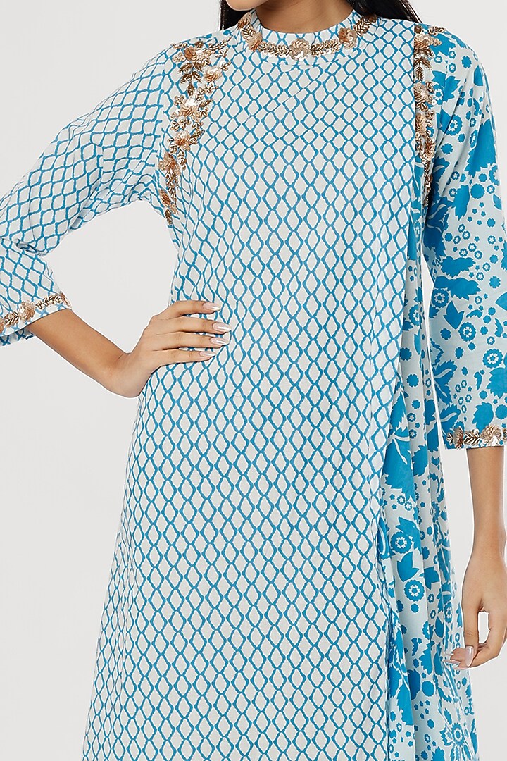 Turquoise Embroidered Half & Half Tunic by zeel doshi thakkar at Pernia's Pop Up Shop