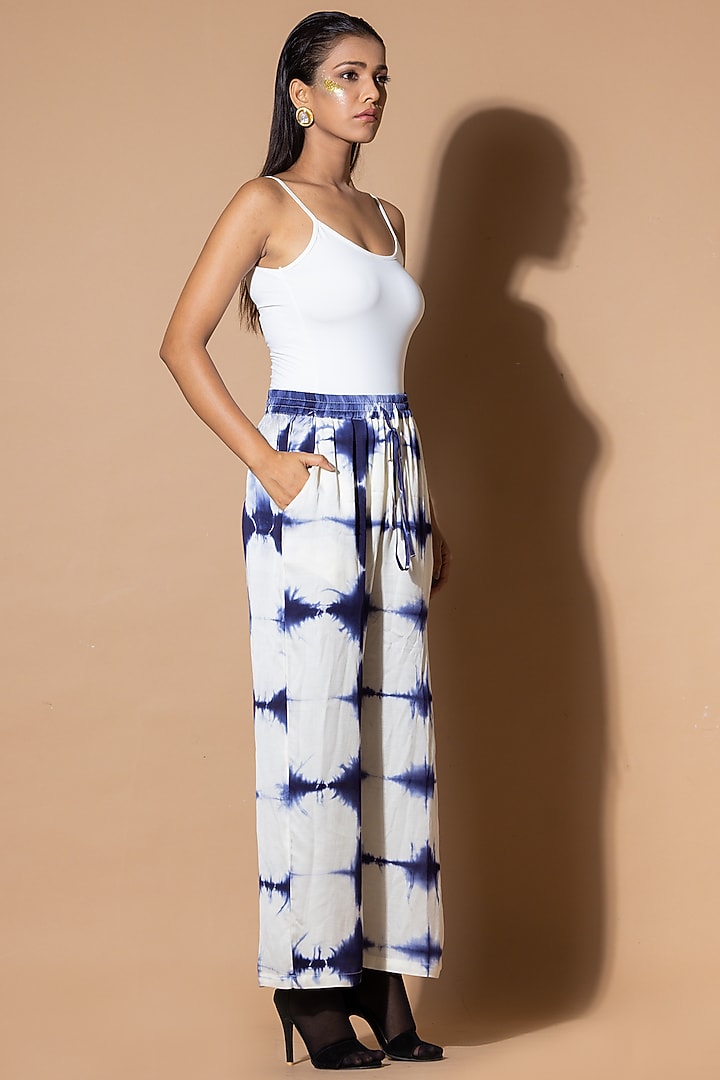 Blue & White Modal Satin Tie-Dye Pants by Zeefaa at Pernia's Pop Up Shop