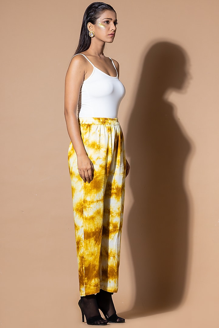Mustard & White Modal Satin Tie-Dye Pants by Zeefaa at Pernia's Pop Up Shop