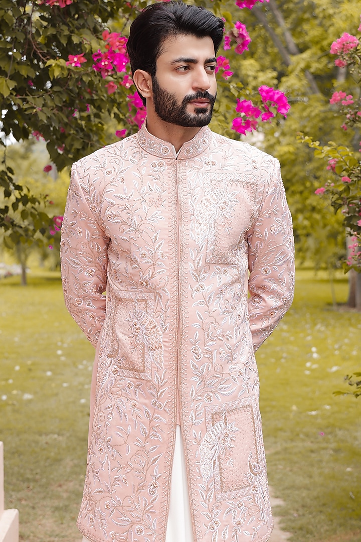 Peach Crepe Machine & Hand Embroidered Groom Indowestern Set by ZENITH COUTURE at Pernia's Pop Up Shop