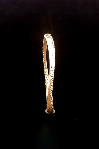 18kt Yellow Gold Finish Twisted Wave Bangle by Zewar By Valchandson jewellers