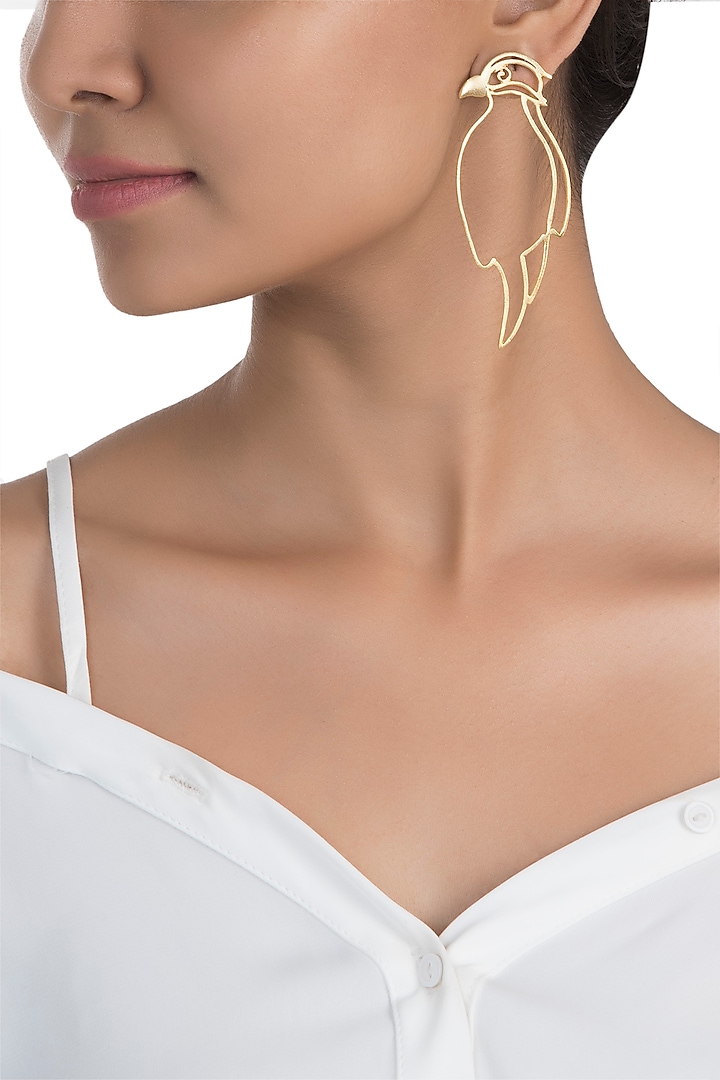 Gold plated bird of paradise earrings by ZOHRA