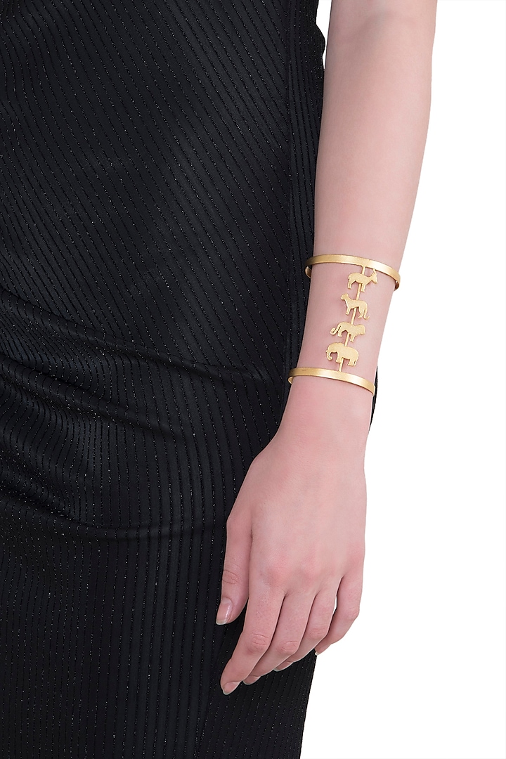 Gold plated animal silhouettes cuff by ZOHRA