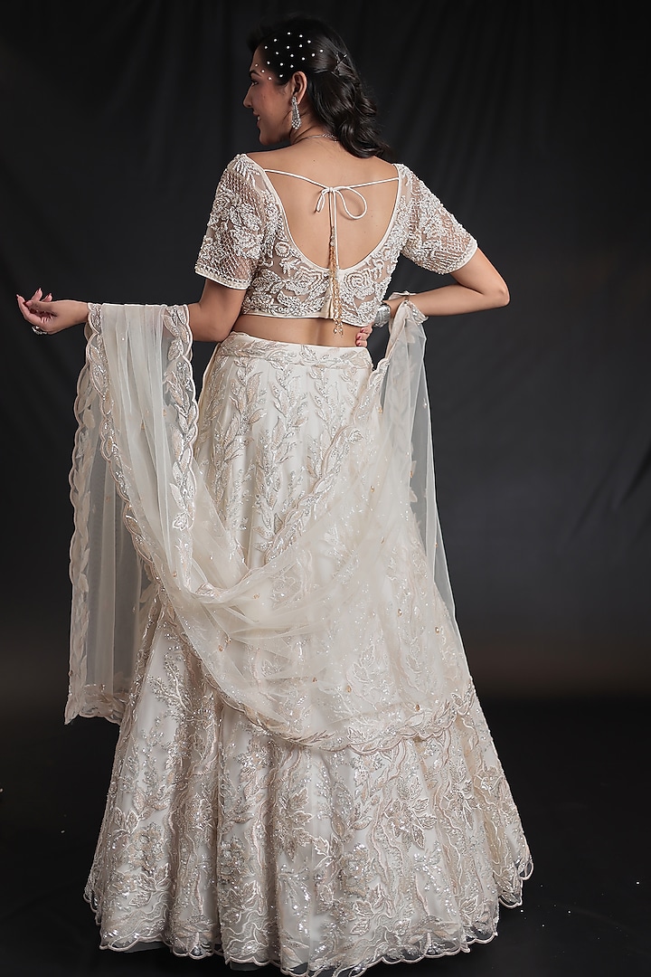 Cream Net Sequins Embroidered Wedding Lehenga Set by Zari Jaipur at Pernia's Pop Up Shop