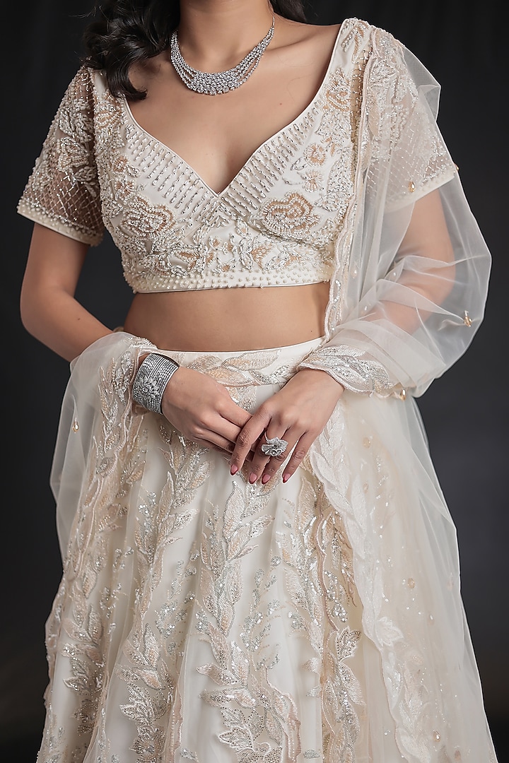Cream Net Sequins Embroidered Wedding Lehenga Set by Zari Jaipur at Pernia's Pop Up Shop