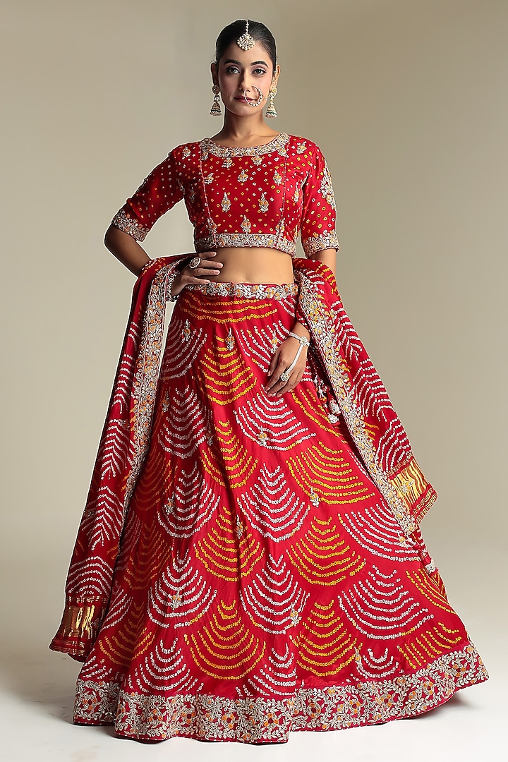 Red Satin Silk Embroidered Bandhej Bridal Lehenga Set by Zari Jaipur at Pernia's Pop Up Shop