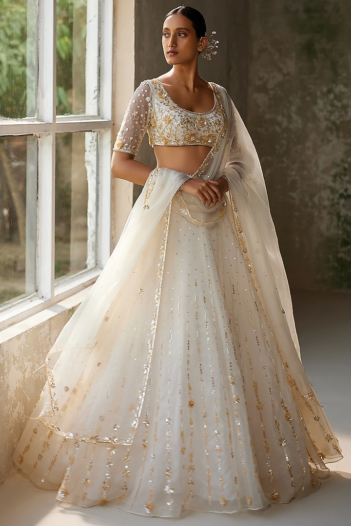 Ivory Pure Silk Organza Aari Hand Embroidered Wedding Lehenga Set by Zoon Tribe at Pernia's Pop Up Shop