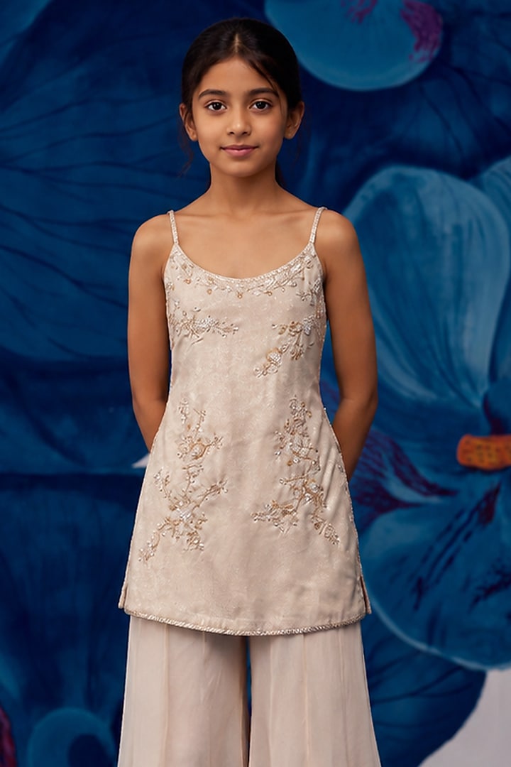 Nude Metallic Satin Aari Embroidered Sharara Set For Girls by Zoon Tribe Kids at Pernia's Pop Up Shop