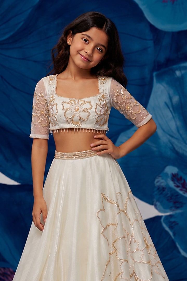 Ivory Metallic Organza Aari Embroidered Lehenga Set For Girls by Zoon Tribe Kids at Pernia's Pop Up Shop