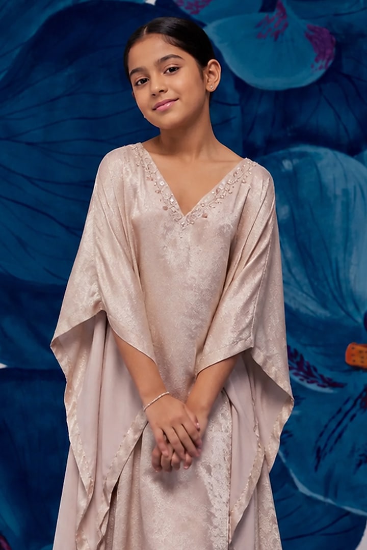 Nude Metallic Satin Aari Embroidered Kaftan For Girls by Zoon Tribe Kids at Pernia's Pop Up Shop