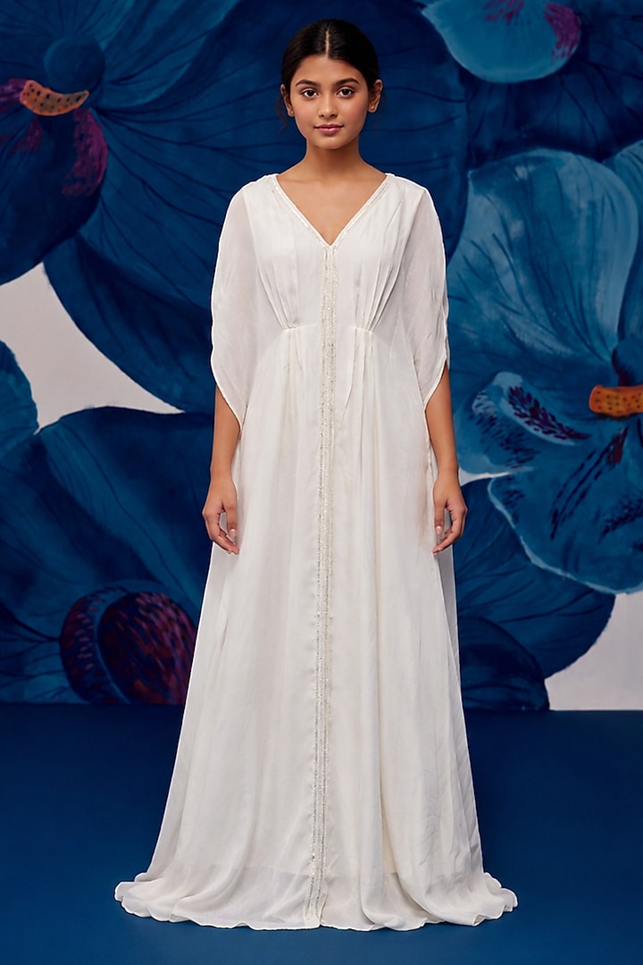 Ivory Muslin Aari Embroidered Kaftan For Girls by Zoon Tribe Kids at Pernia's Pop Up Shop
