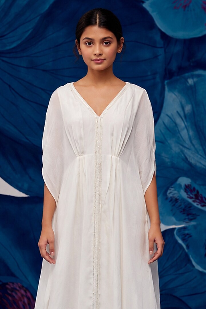 Ivory Muslin Aari Embroidered Kaftan For Girls by Zoon Tribe Kids at Pernia's Pop Up Shop