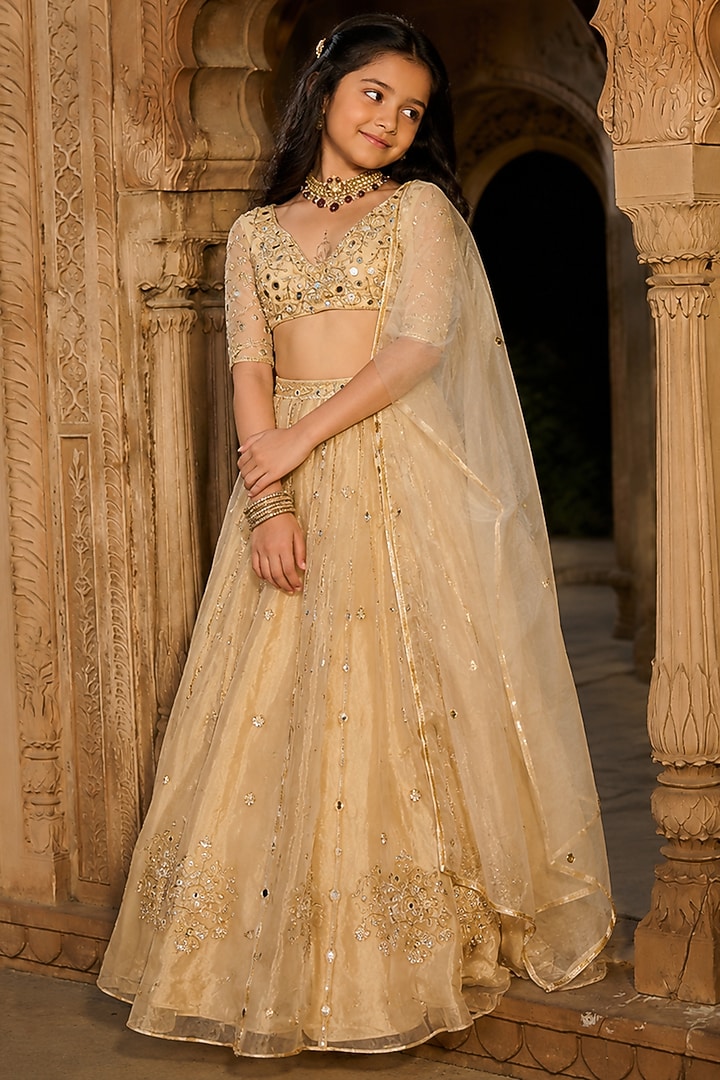 Gold Silk Tissue Aari & Mirror Embroidered Lehenga Set For Girls by Zoon Tribe Kids at Pernia's Pop Up Shop