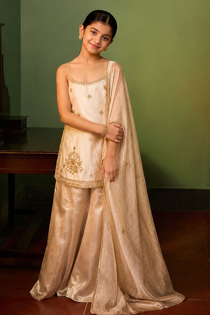 Custard Banarasi Shimmer Hand Embroidered Sharara Set For Girls by Zoon Tribe Kids at Pernia's Pop Up Shop