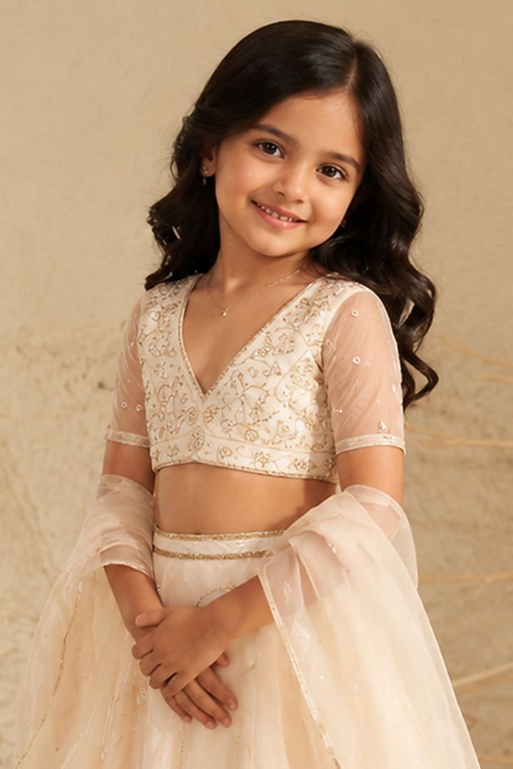 Cream Metallic Organza Hand Embroidered Lehenga Set For Girls by Zoon Tribe Kids at Pernia's Pop Up Shop