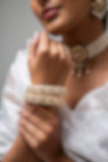 Gold Finish Kundan Polki & White Stone Kadas (Set Of 2) by Zevar King at Pernia's Pop Up Shop