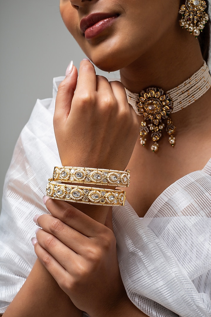 Gold Finish Kundan Polki & White Stone Kadas (Set Of 2) by Zevar King at Pernia's Pop Up Shop