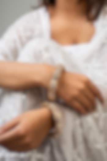 Gold Finish Kundan Polki & Red Stone Kadas (Set Of 2) by Zevar King at Pernia's Pop Up Shop