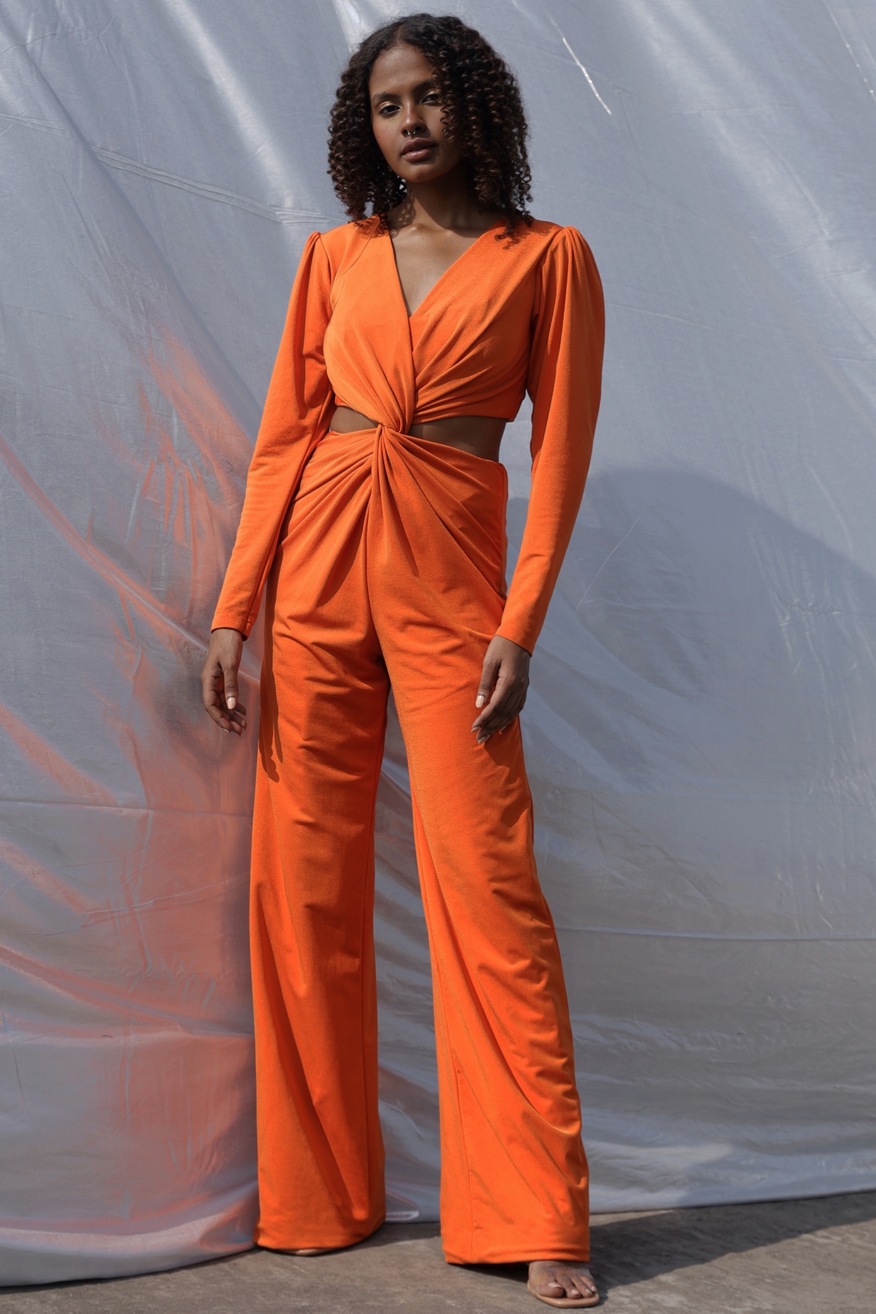 Tangerine Lycra Cut Out Jumpsuit by Zwaan at Pernia s Pop Up Shop 2024