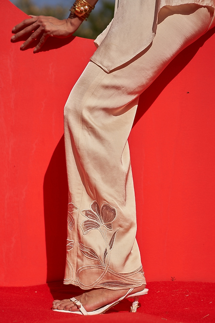 Ivory Linen Satin Embroidered Pants by Zwaan at Pernia's Pop Up Shop