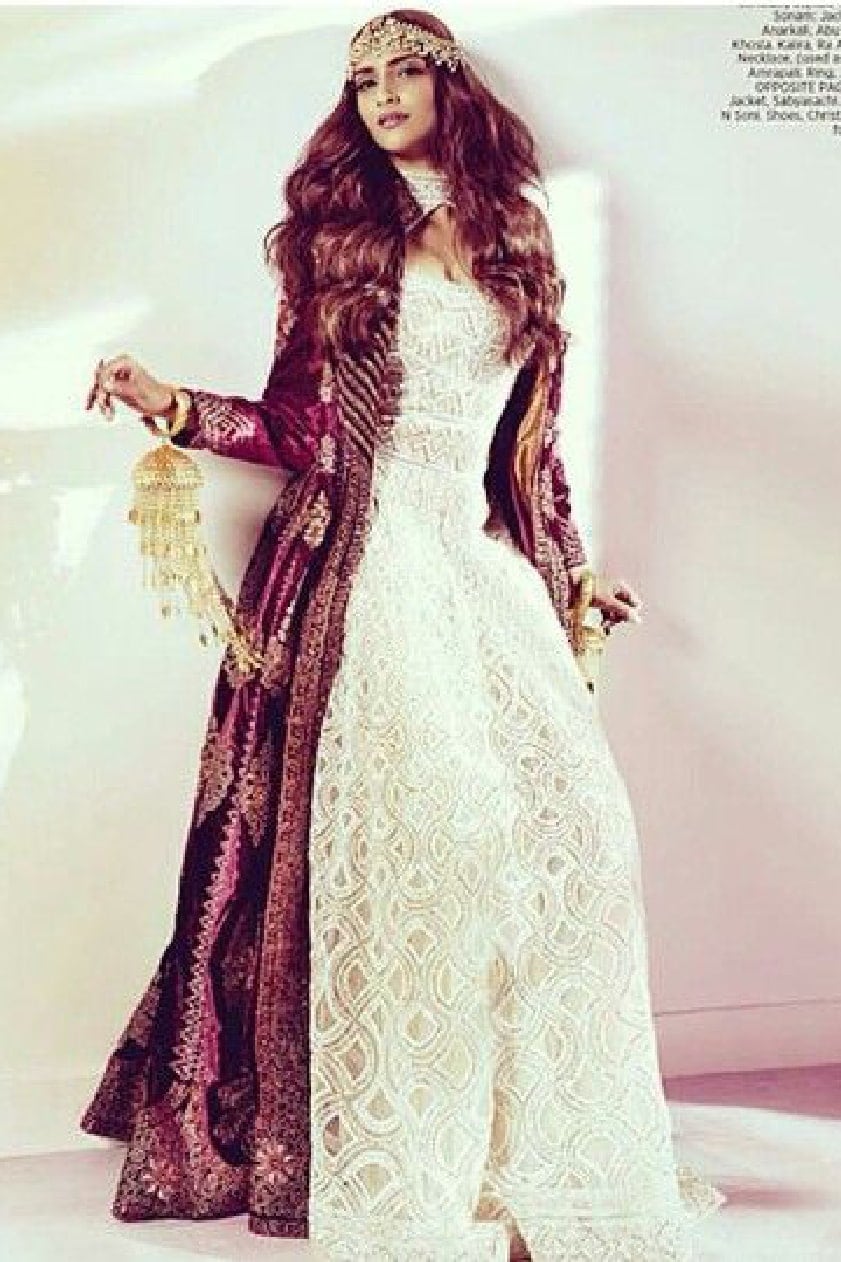 Sonam Kapoor looks exquisite in a white hand embroidered gown, layered with a lush embellished long jacket by JJ Valaya. by Sonam Kapoor-WHY CELEBS PREFER JJ VALAYA