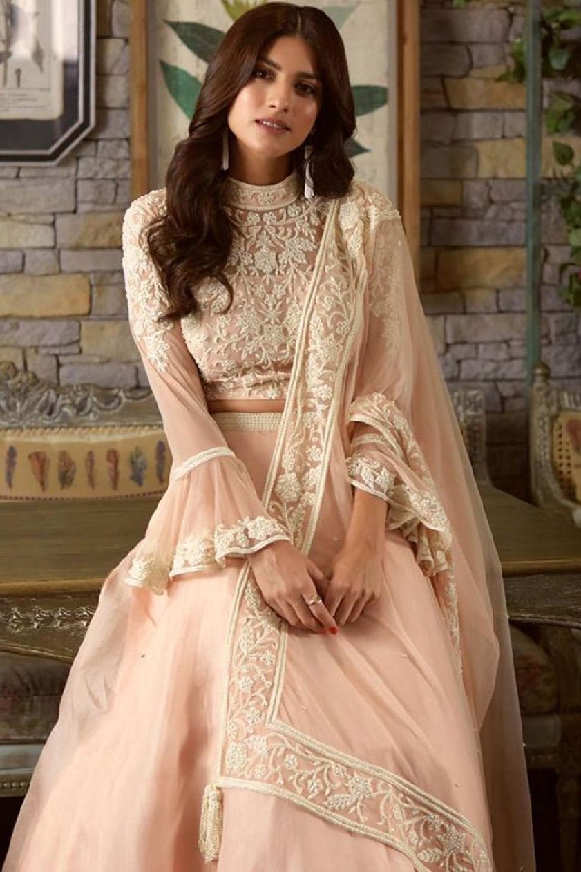 Sapna Pabbi adorned a beautiful baby pink lehenga ensemble by Malasa. The creation features pearl-embellished embroidery. 
 by Sapna Pabbi
-WHY CELEBS PREFER MALASA