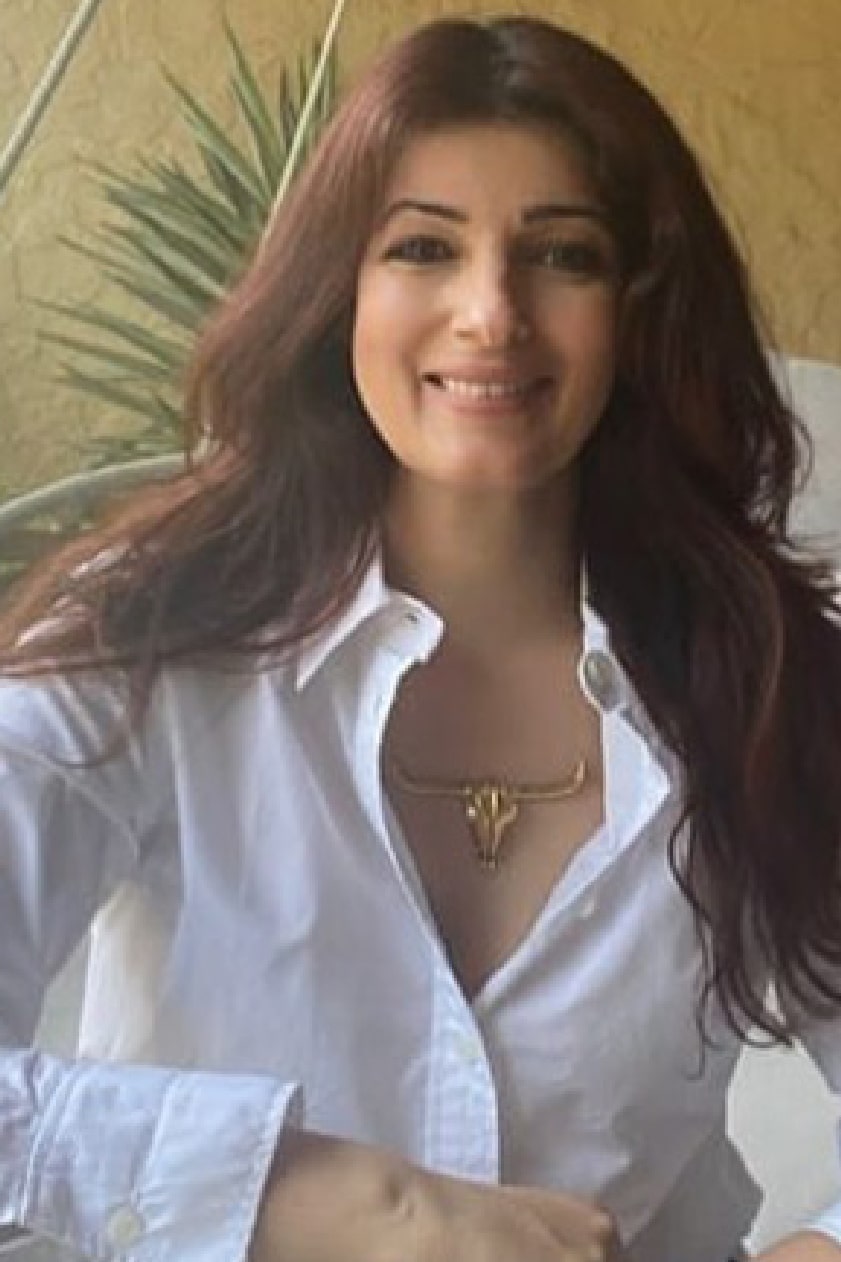 Twinkle Khanna styled her classic white shirt with a bisonhead pendant by Kichu. 
 by Twinkle Khanna
-Twinkle Khanna
