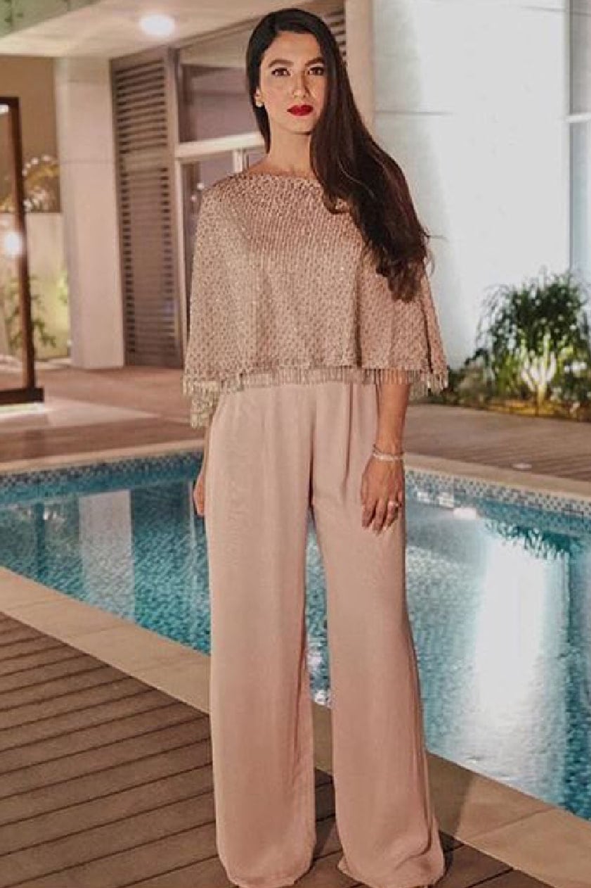 Gauhar Khan made a statement wearing an embellished monochrome cape jumpsuit by Malasa. She styled her look with minimal baubles. 
 by Gauhar Khan-WHY CELEBS PREFER MALASA